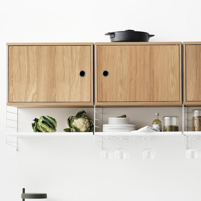 Schrank mit Schwingtür 58x30cm - String Furniture
