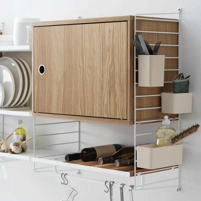 Schrank mit Schwenktür 58x30cm Eiche – String Furniture
